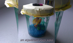 Pour la fête des pères, nous avons réaliser un joli DIY : un aquarium dans un bocal de confiture. Tout simple, les enfants vont adorer (et les papas aussi)!